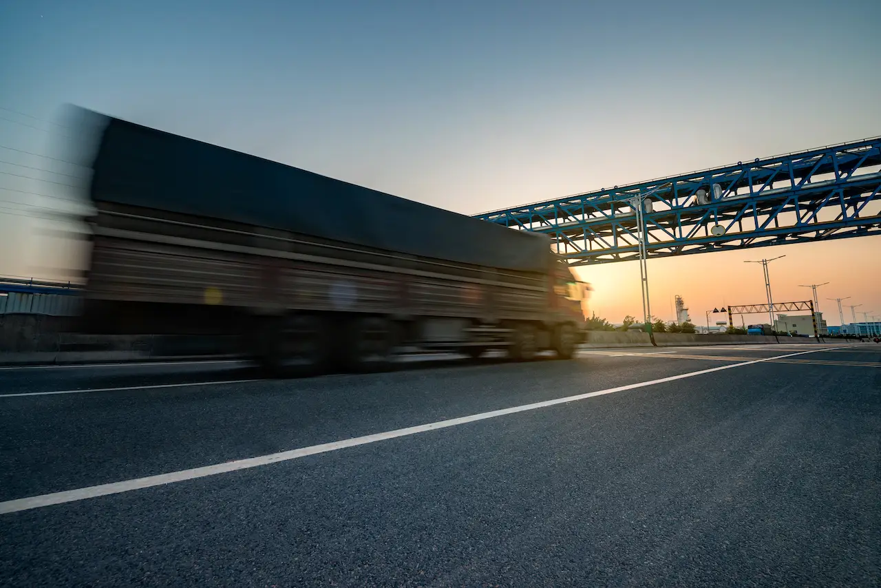 truck in motion on a highway at sunset 2026 09 25 07 54 11 utc